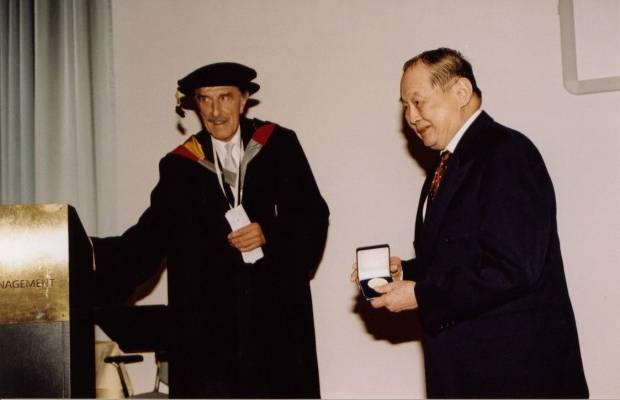 Mr. Yap Kie Han receiving MSM honorary medal in 2002